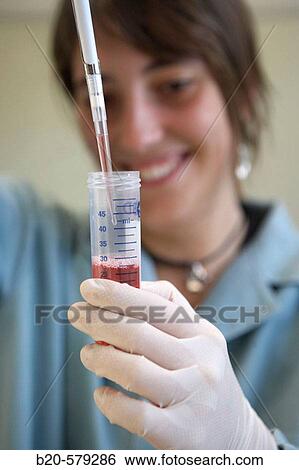 Taking samples with glass pipette from a falacon tube. Laboratory, Fundaci? n Inbiomed, Genetrix Group. Center for research in stem cells and regenerative medicine. Donostia, San Sebastian, Euskadi. Spain. View Large Photo Image Stock Photograph - Taking samples with glass pipette from a falacon tube. Laboratory, Fundaci? n Inbiomed, Genetrix Group. Center for research in stem cells and regenerative medicine. Donostia, San Sebastian, Euskadi. Spain.. Fotosearch