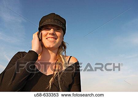 Talking on mobile phone. View Large Photo Image Stock Image - Talking on mobile phone.. Fotosearch
