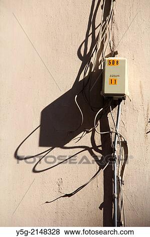 tangled electrical wires cables on wall in rome italy View Large Photo Image Stock Photo - tangled electrical wires cables on wall in rome italy. Fotosearch