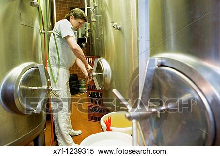 Tanks of Beer in the storage cellar maduration Beer production in Pivovar Brewery restaurant 20, Vodickova street Prague Czech Republic View Large Photo Image Stock Photography - Tanks of Beer in the storage cellar maduration Beer production in Pivovar Brewery restaurant 20, Vodickova street Prague Czech Republic. Fotosearch