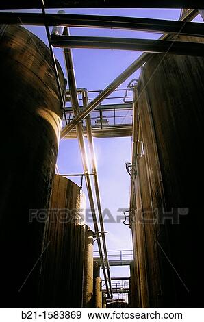 Stock Photo - Tanks where the wine grapes juice is received before the distillation, Domaine du Tariquet wines and armagnac estate, near Eauze, Gers, Midi-Pyrenees, France. Fotosearch