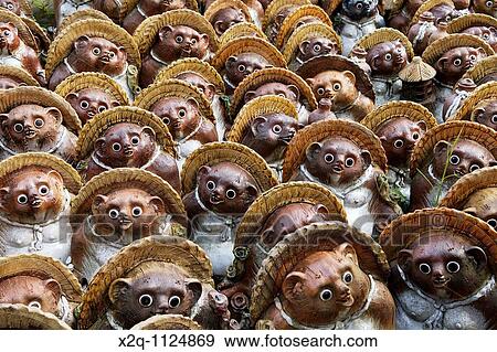 Stock Photo - Tanuki Badger Statuettes, Japan. Fotosearch