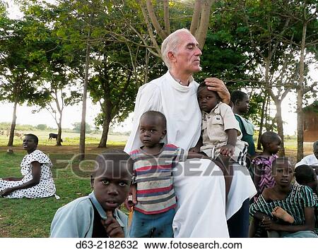 TANZANIA. American missionary priest at Home of Compassion, Kigera village, near Musoma. Mike with Ernesti. Preaching the Sermon on the Mount to children. View Large Photo Image Stock Image - TANZANIA. American missionary priest at Home of Compassion, Kigera village, near Musoma. Mike with Ernesti. Preaching the Sermon on the Mount to children.. Fotosearch