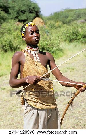 Tanzania, Lake Eyasi, Hadzabe tribespeople View Large Photo Image Stock Photograph - Tanzania, Lake Eyasi, Hadzabe tribespeople. Fotosearch