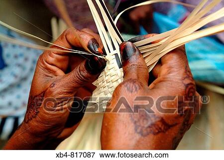 Tanzania, Zanzibar, making basket View Large Photo Image Stock Photo - Tanzania, Zanzibar, making basket. Fotosearch