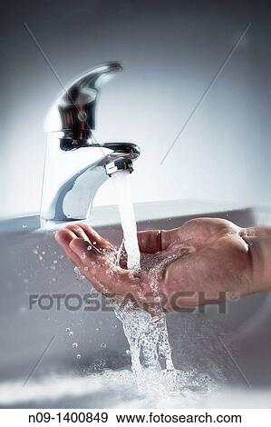 tap open hand that receives water View Large Photo Image Stock Photo - tap open hand that receives water. Fotosearch