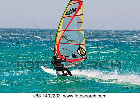 Stock Image - Tarifa is Windsurfer's paradise. Fotosearch