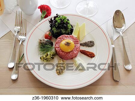 Tartar steak with egg. View Large Photo Image Stock Image - Tartar steak with egg.. Fotosearch