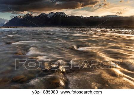 Stock Image - Tasman Valley river flats at dawn, outflow from tasman glacier, Aoraki Mount Cook National Park. Fotosearch