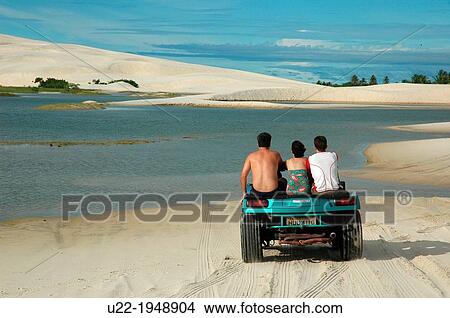 Tatajuba, CearB, Brazil, dune-buggy with tourists on the dunes between Tatajuba and Jericoacoara View Large Photo Image Picture - Tatajuba, CearB, Brazil, dune-buggy with tourists on the dunes between Tatajuba and Jericoacoara. Fotosearch