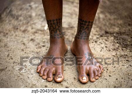 Tattoo on feet, Oriya tribe, Orissa, India. View Large Photo Image Picture - Tattoo on feet, Oriya tribe, Orissa, India.. Fotosearch