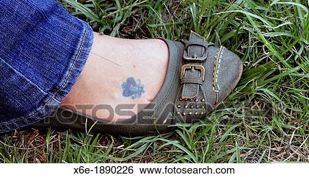 Stock Photograph - Tattooed leg, Ndola, Zambia. Fotosearch