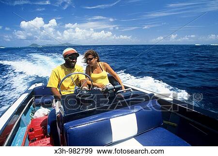 Stock Photo - taxi-boat, Tobago Cays, Grenadines islands, Saint Vincent and the Grenadines, Winward Islands, Lesser Antilles, Caribbean Sea. Fotosearch