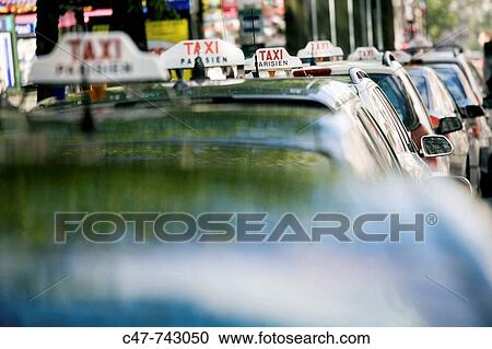 Stock Image - Taxi cabs. Paris. France.. Fotosearch