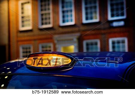 taxi in front of a classic office building in the City of London, England, UK View Large Photo Image Stock Photo - taxi in front of a classic office building in the City of London, England, UK. Fotosearch