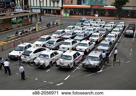 Taxi parked accurately in front of Akita train station and driver waiting customer. View Large Photo Image Stock Image - Taxi parked accurately in front of Akita train station and driver waiting customer.. Fotosearch