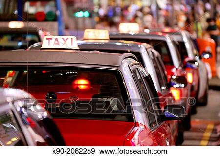 Stock Photo - Taxi queue, Hong Kong, China, East Asia.. Fotosearch