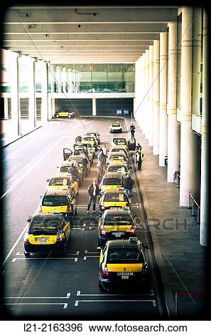 Stock Photograph - Taxi ranks. Airport, Barcelona, Catalonia, Spain.. Fotosearch