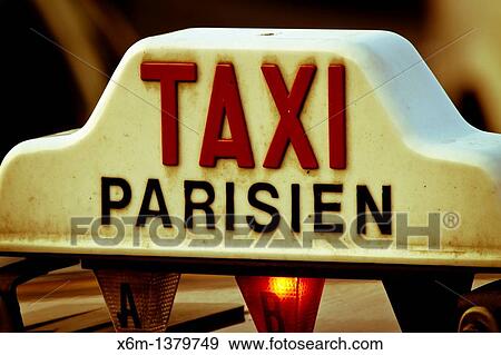 Stock Photo - Taxi sign Paris, France. Fotosearch