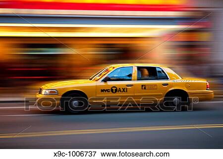 Stock Photo - Taxi Speeding Through New York. Fotosearch