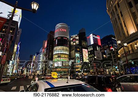 Taxi traffic at dusk in Ginza, Tokyo, Japan. View Large Photo Image Stock Image - Taxi traffic at dusk in Ginza, Tokyo, Japan.. Fotosearch