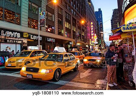 Taxis, Night view of Times Square, Manhattan, New York, USA View Large Photo Image Stock Image - Taxis, Night view of Times Square, Manhattan, New York, USA. Fotosearch