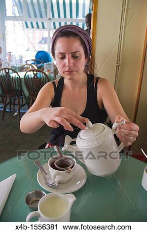 Tea drinking Muffinman tea room Kensington district London England UK Europe View Large Photo Image Stock Image - Tea drinking Muffinman tea room Kensington district London England UK Europe. Fotosearch