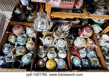 Tea pots and china on display and for sale, Everyday living, street scene, chinatown, bangkok, Thailand View Large Photo Image Stock Photography - Tea pots and china on display and for sale, Everyday living, street scene, chinatown, bangkok, Thailand. Fotosearch