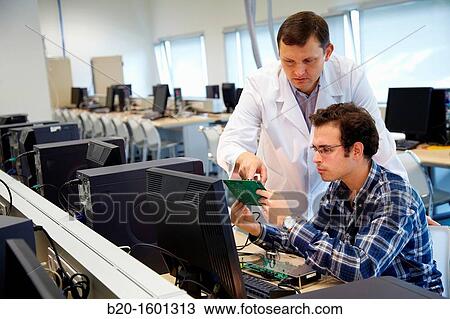 Teacher and student, Laboratory digital signal processing, Computer room, Telecommunications, Electronics and Communications Unit, CEIT (Center of Studies and Technical Research), University of Navarra, Donostia, Gipuzkoa, Basque Country, Spain View Large Photo Image Stock Image - Teacher and student, Laboratory digital signal processing, Computer room, Telecommunications, Electronics and Communications Unit, CEIT (Center of Studies and Technical Research), University of Navarra, Donostia, Gipuzkoa, Basque Country, Spain. Fotosearch