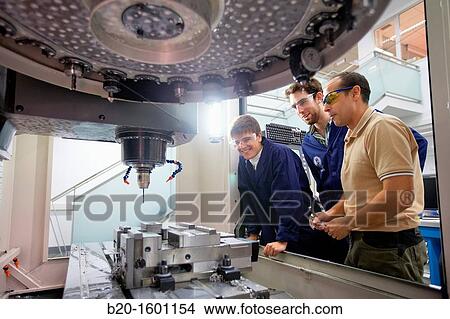 Teacher and students do their training center 3-axis machining, Applied Mechanics, Tecnun, School of Engineering of San Sebastian, University of Navarra, Donostia, Gipuzkoa, Basque Country, Spain View Large Photo Image Picture - Teacher and students do their training center 3-axis machining, Applied Mechanics, Tecnun, School of Engineering of San Sebastian, University of Navarra, Donostia, Gipuzkoa, Basque Country, Spain. Fotosearch