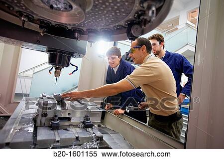 Teacher and students do their training center 3-axis machining, Applied Mechanics, Tecnun, School of Engineering of San Sebastian, University of Navarra, Donostia, Gipuzkoa, Basque Country, Spain View Large Photo Image Stock Photography - Teacher and students do their training center 3-axis machining, Applied Mechanics, Tecnun, School of Engineering of San Sebastian, University of Navarra, Donostia, Gipuzkoa, Basque Country, Spain. Fotosearch