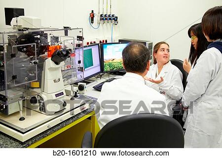Teacher and students. Inverted optical microscope. View Large Photo Image Stock Image - Teacher and students. Inverted optical microscope.. Fotosearch