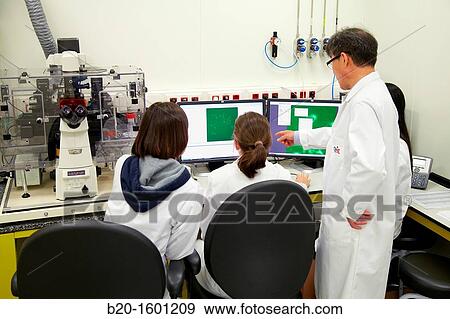 Teacher and students. Inverted optical microscope. View Large Photo Image Stock Photo - Teacher and students. Inverted optical microscope.. Fotosearch