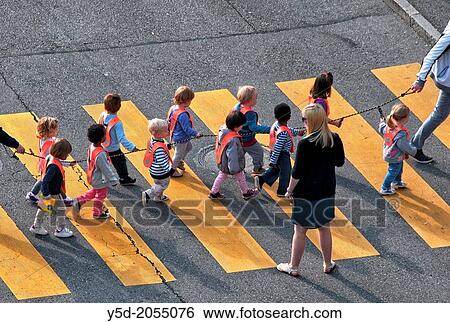 teaching children how to walk through the streets, Geneva, Switzerland View Large Photo Image Stock Photograph - teaching children how to walk through the streets, Geneva, Switzerland. Fotosearch