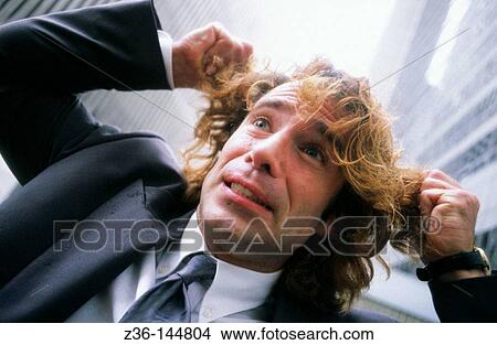 Picture - Tearing off hair. Fotosearch
