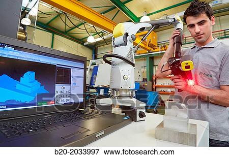 Technical inspecting production piece. MCAx measuring arm. Coordinate measuring machine portable with escanner for contactless measurement. Innovative Metrology applied. Sariki Metrology. Elgoibar. Gipuzkoa. Basque Country. Spain. View Large Photo Image Stock Photo - Technical inspecting production piece. MCAx measuring arm. Coordinate measuring machine portable with escanner for contactless measurement. Innovative Metrology applied. Sariki Metrology. Elgoibar. Gipuzkoa. Basque Country. Spain.. Fotosearch