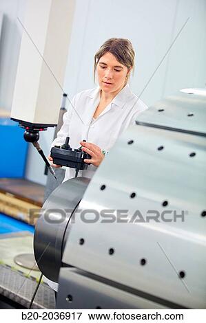 Stock Photo - Technical measuring wind component in three-dimensional machine. CMM. Coordinate Measuring Machine. Innovative Metrology applied. Sariki Metrology. Elgoibar. Gipuzkoa. Basque Country. Spain.. Fotosearch