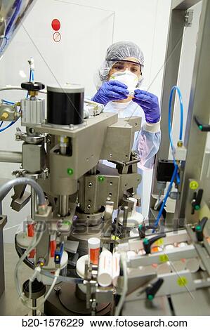 Technical monitoring under a dispensing process and closing of a gel, Clean room, Pharmaceutical plant, Drug manufacturing plant, Research Center, Pharmacy, Area Health, Tecnalia Research & Innovation, Araba Technology Park, Miano, Basque Country, Spain View Large Photo Image Stock Photo - Technical monitoring under a dispensing process and closing of a gel, Clean room, Pharmaceutical plant, Drug manufacturing plant, Research Center, Pharmacy, Area Health, Tecnalia Research & Innovation, Araba Technology Park, Miano, Basque Country, Spain. Fotosearch
