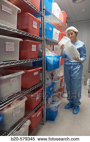 Technical staff in storage area. Clean room. Laboratory, Fundaci? n Inbiomed, Genetrix Group. Center for research in stem cells and regenerative medicine. Donostia, San Sebastian, Euskadi. Spain. View Large Photo Image Stock Photography - Technical staff in storage area. Clean room. Laboratory, Fundaci? n Inbiomed, Genetrix Group. Center for research in stem cells and regenerative medicine. Donostia, San Sebastian, Euskadi. Spain.. Fotosearch