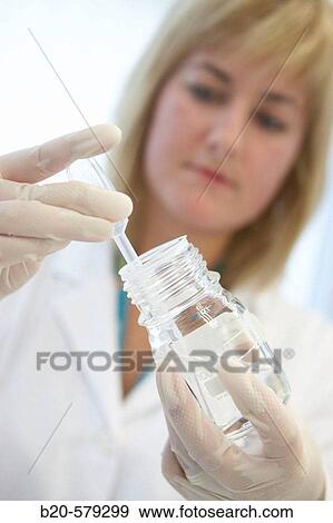 Technical staff taking samples of chemical solution. Laboratory, Fundaci? n Inbiomed, Genetrix Group. Center for research in stem cells and regenerative medicine. Donostia, San Sebastian, Euskadi. Spain. View Large Photo Image Stock Photo - Technical staff taking samples of chemical solution. Laboratory, Fundaci? n Inbiomed, Genetrix Group. Center for research in stem cells and regenerative medicine. Donostia, San Sebastian, Euskadi. Spain.. Fotosearch