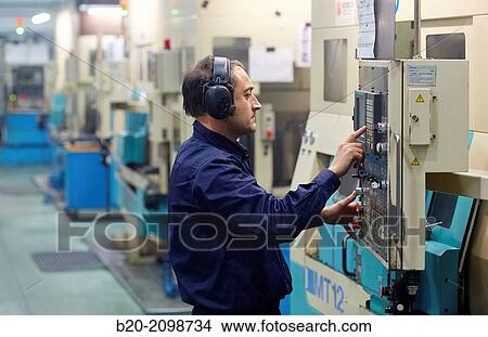 Technician CNC control. Area automated CNC lathes. Machined Indecober. Machining of precision parts in series. Automotive industry. Berriz. Bizkaia. Basque Country. Spain. View Large Photo Image Picture - Technician CNC control. Area automated CNC lathes. Machined Indecober. Machining of precision parts in series. Automotive industry. Berriz. Bizkaia. Basque Country. Spain.. Fotosearch