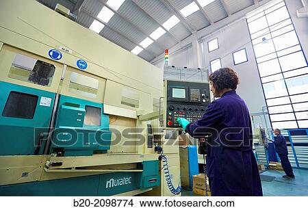 Technician CNC control. Area automated CNC lathes. Machined Indecober. Machining of precision parts in series. Automotive industry. Berriz. Bizkaia. Basque Country. Spain. View Large Photo Image Picture - Technician CNC control. Area automated CNC lathes. Machined Indecober. Machining of precision parts in series. Automotive industry. Berriz. Bizkaia. Basque Country. Spain.. Fotosearch