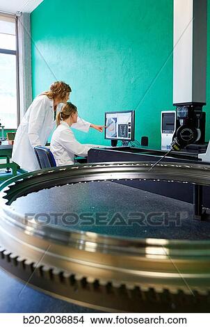 Technicians inspecting aircraft component. Measurement of a piece in CMM. Coordinate Measuring Machine. Innovative Metrology applied. Sariki Metrology. Elgoibar. Gipuzkoa. Basque Country. Spain. View Large Photo Image Picture - Technicians inspecting aircraft component. Measurement of a piece in CMM. Coordinate Measuring Machine. Innovative Metrology applied. Sariki Metrology. Elgoibar. Gipuzkoa. Basque Country. Spain.. Fotosearch