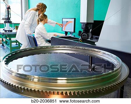 Stock Image - Technicians inspecting aircraft component. Measurement of a piece in CMM. Coordinate Measuring Machine. Innovative Metrology applied. Sariki Metrology. Elgoibar. Gipuzkoa. Basque Country. Spain.. Fotosearch