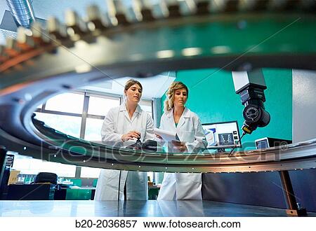 Stock Photo - Technicians inspecting aircraft component. Measurement of a piece in CMM. Coordinate Measuring Machine. Innovative Metrology applied. Sariki Metrology. Elgoibar. Gipuzkoa. Basque Country. Spain.. Fotosearch