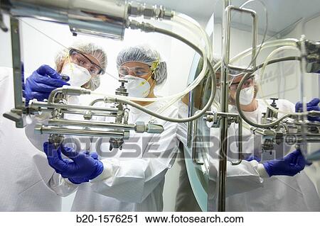 Technicians performing maintenance functions on a solid coating machine, Pharmaceutical plant, Drug manufacturing plant, Research Center, Pharmacy, Area Health, Tecnalia Research & Innovation, Araba Technology Park, Miano, Basque Country, Spain View Large Photo Image Stock Image - Technicians performing maintenance functions on a solid coating machine, Pharmaceutical plant, Drug manufacturing plant, Research Center, Pharmacy, Area Health, Tecnalia Research & Innovation, Araba Technology Park, Miano, Basque Country, Spain. Fotosearch