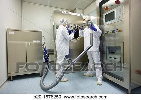 Technicians preparing a tablet coating process, Clean room, Pharmaceutical plant, Drug manufacturing plant, Research Center, Pharmacy, Area Health, Tecnalia Research & Innovation, Araba Technology Park, Miano, Basque Country, Spain View Large Photo Image Stock Image - Technicians preparing a tablet coating process, Clean room, Pharmaceutical plant, Drug manufacturing plant, Research Center, Pharmacy, Area Health, Tecnalia Research & Innovation, Araba Technology Park, Miano, Basque Country, Spain. Fotosearch