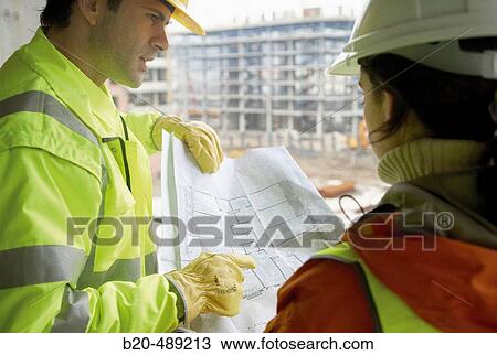 Technicians with reflective clothes and safety equipment. Housing construction, apartments. San Sebastian, Gipuzkoa, Euskadi. Spain. View Large Photo Image Stock Image - Technicians with reflective clothes and safety equipment. Housing construction, apartments. San Sebastian, Gipuzkoa, Euskadi. Spain.. Fotosearch