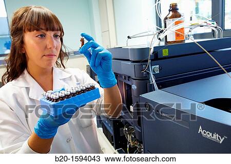 Stock Image - Tecnalia researcher conducting an analysis by high resolution liquid chromatography. Fotosearch