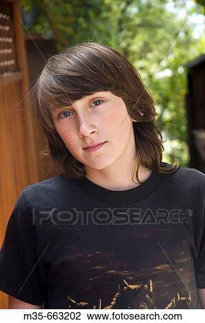 Teen boy in black shirt View Large Photo Image Stock Image - Teen boy in black shirt. Fotosearch